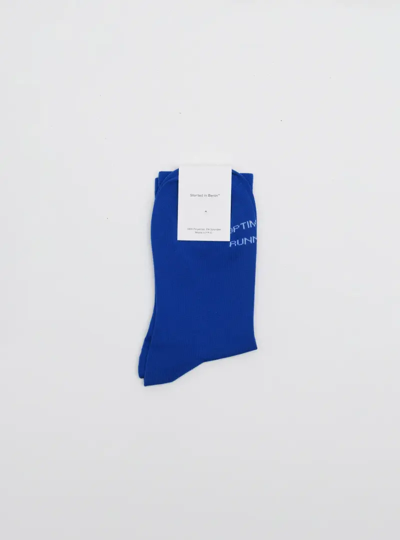 blue_socks_optimistic_runners